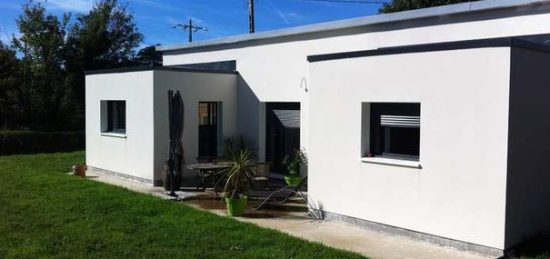 Construction d’une maison bois contemporaine à toit plat